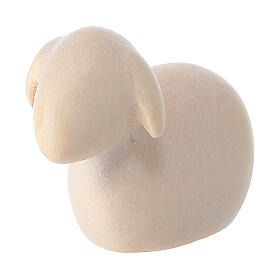 Stylizowana figurka leżącej owcy z malowanego drewna, Val Gardena