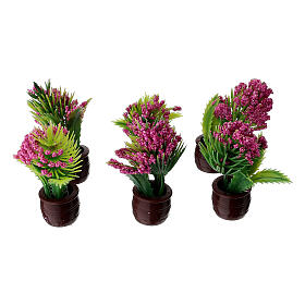 Vaso marrone con pianta con fiori magenta presepe da 10-12 cm