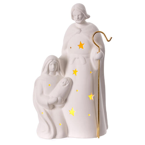 Nativity Holy Family in porcelain warm light stars golden staff 25x15x5 cm 1