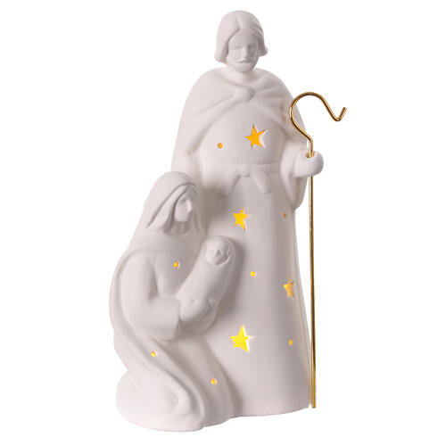 Nativity Holy Family in porcelain warm light stars golden staff 25x15x5 cm 3