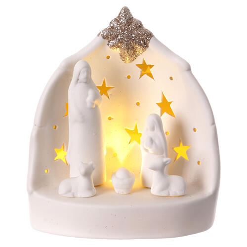 Natividad estilizada cueva porcelana blanca luz cálida estrellas 15 cm 1