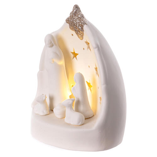 Natividad estilizada cueva porcelana blanca luz cálida estrellas 15 cm 2