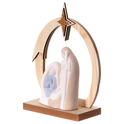 Stylised Nativity with wooden stable and star, porcelain, 15x10x5 cm 2