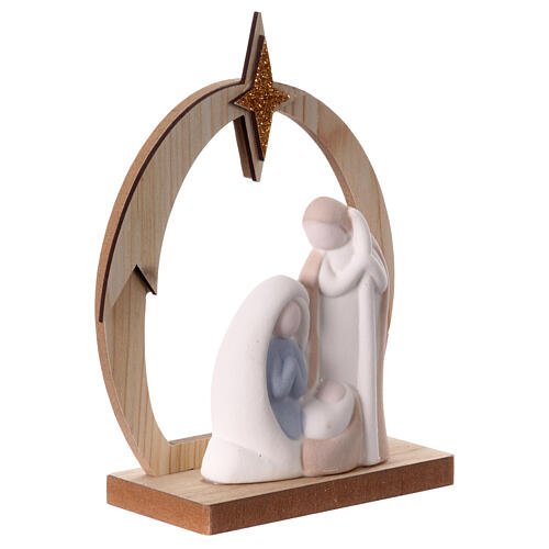 Stylised Nativity with wooden stable and star, porcelain, 15x10x5 cm 3