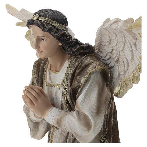 Guardian angel in adoration, resin, 24x22x14 in 5