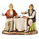 Pareja sentada a la mesa belén Moranduzzo 8 cm s1