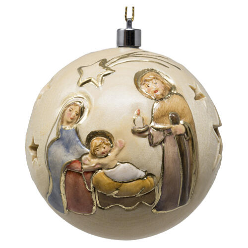 Christmas ball with carved Nativity, Val Gardena painted wood, 2.2 in, warm light 2