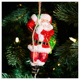 Santa climbing a rope, Christmas ornament, blown glass, 5 in