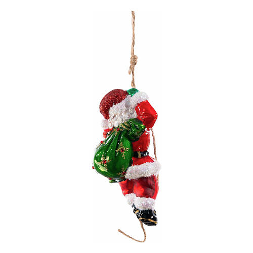 Santa climbing a rope, Christmas ornament, blown glass, 5 in 4