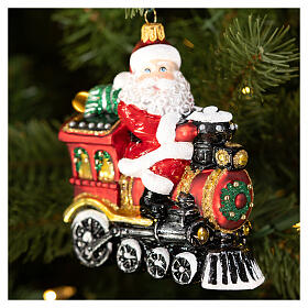 Santa Claus on train blown glass Christmas tree ornament, height 12 cm