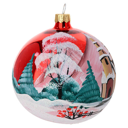 Christmas ball of polished red blown glass, snowy mountain landscape with church, 4 in 3