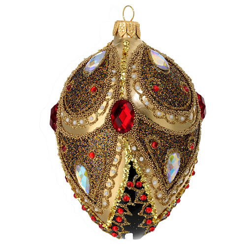 Egg-shaped Christmas ball, black blown glass with gold lines, gold glitter, red and white strass, 2.5 in 3