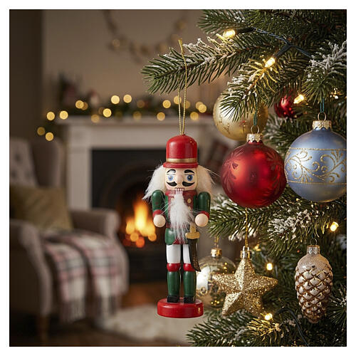 Wooden Christmas nutcracker tree ornament with green and red saber 2