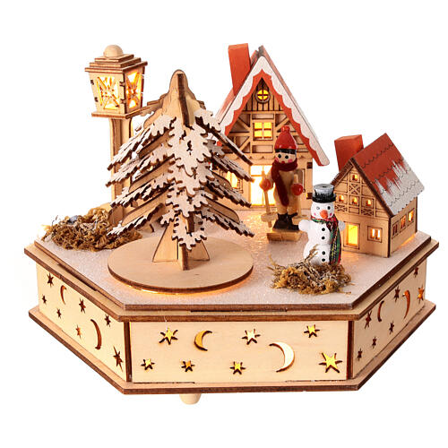 Wooden Christmas village of hexagonal shape with music box, snow and lights, 6x6x8 in 1