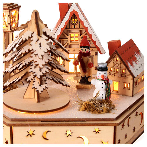 Wooden Christmas village of hexagonal shape with music box, snow and lights, 6x6x8 in 2