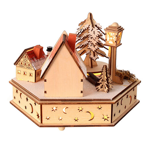 Wooden Christmas village of hexagonal shape with music box, snow and lights, 6x6x8 in 5