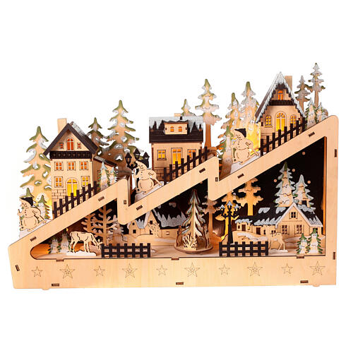 Wooden Christmas village set: snowy slope with lights and motion, 12x18x4 in 1