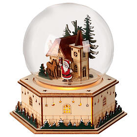 Schneekugel mit Weihnachtsmann, Schneemann und Kirche – Holz, LEDs, H 17,5 cm