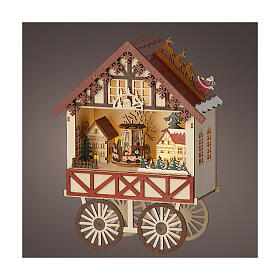 Christmas setting: wooden house on wheels with LED lights, 8x10x4 in