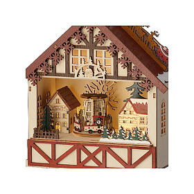 Christmas setting: wooden house on wheels with LED lights, 8x10x4 in