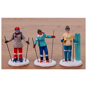 Figurines for Christmas village set, assorted skiers, h 6 in