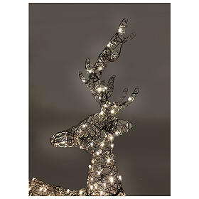 Seated wicker reindeer with fixed warm white LED lights, 43x32 in