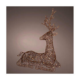 Seated wicker reindeer with warm white fixed LEDs, 110x82 cm