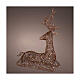 Seated wicker reindeer with warm white fixed LEDs, 110x82 cm s1