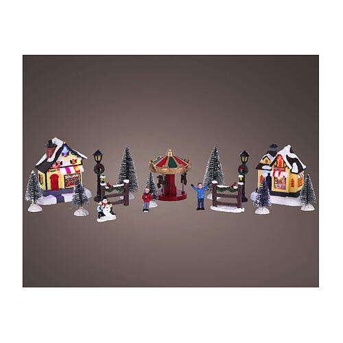 Snowy Christmas scene with coloured LEDs, 4 in 1