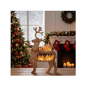Battery-operated Christmas village, wooden reindeer, 28x17x4 in, warm white LEDs