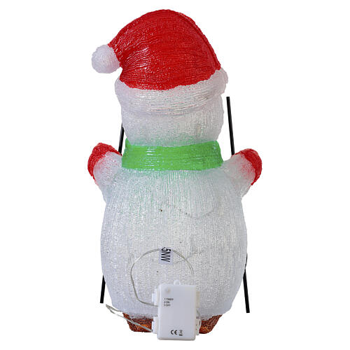 Acrylic snowman with skis, 50 cold white LEDs, 20x10x12 in, indoor/outdoor, battery operated 5