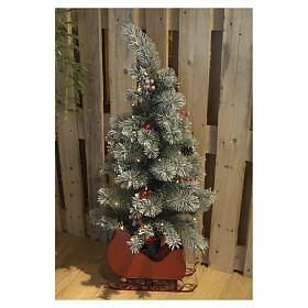 Snowy decorated tree with red sled, 50 battery LEDs, 43.3 in