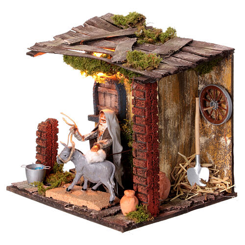 Cena homem escovando o burro presépio napolitano 10 cm movimento 20x20x15 cm 2