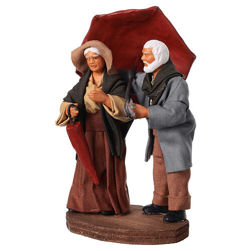 Couple personnes âgées avec parapluie 10 cm crèche napolitaine 3