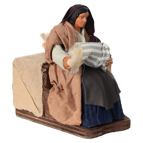 Woman stuffing a pillow: animated figurine for 12 cm Neapolitan Nativity Scene 3