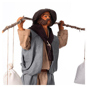 Homme avec 4 sacs pendus en mouvement 24 cm crèche napolitaine
