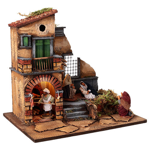 Domek oświetlony 40x30x37 cm z piecem i Świętą Rodziną 10 cm, szopka neapolitańska 5