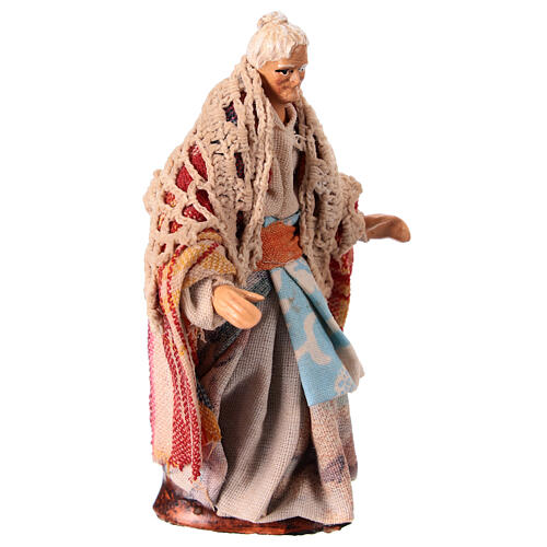 Old woman walking for Neapolitan Nativity Scene, h 10 cm, terracotta and fabric 3