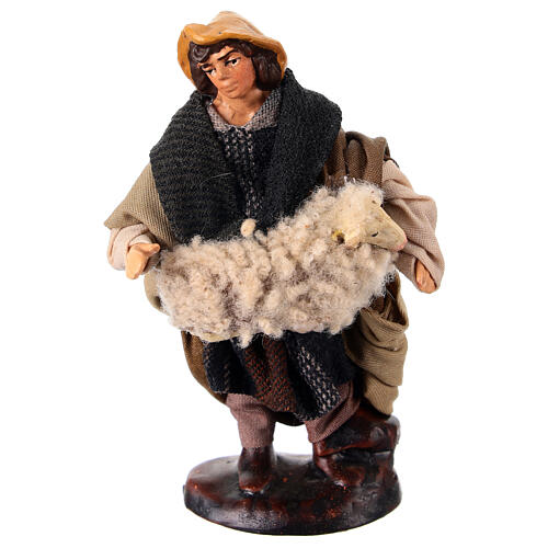 Shepherd with sheep under his arm for Neapolitan Nativity Scene, h 10 cm, terracotta and fabric 1