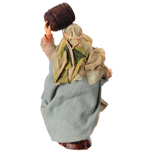 Woman with wine barrel for Neapolitan Nativity Scene, h 10 cm, terracotta and fabric 4