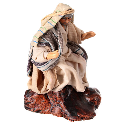 Shepherd sitting on a rock for 10 cm Neapolitan Nativity Scene, terracotta and fabric 3