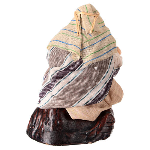 Shepherd sitting on a rock for 10 cm Neapolitan Nativity Scene, terracotta and fabric 4