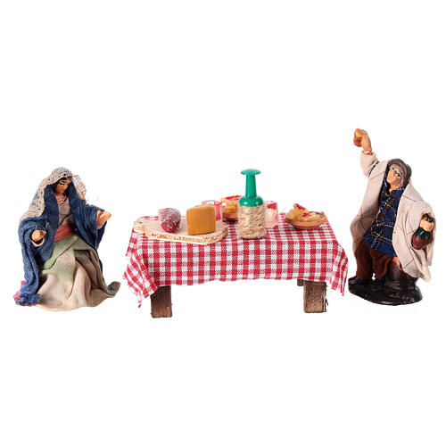 Set of two figurines at a table full of food for 6 cm Neapolitan Nativity Scene 1