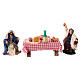 Set of two figurines at a table full of food for 6 cm Neapolitan Nativity Scene s1