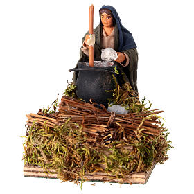 Woman stirring polenta for 10 cm animated Nativity Scene