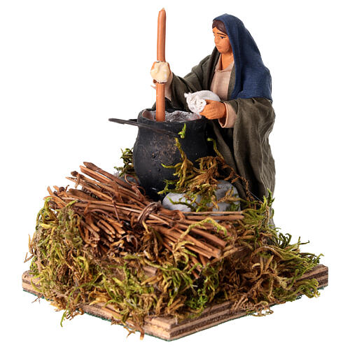 Woman stirring polenta for 10 cm animated Nativity Scene 2