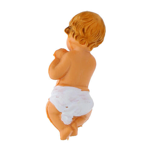 Enfant Jésus dans une mangeoire en résine 6 cm 10