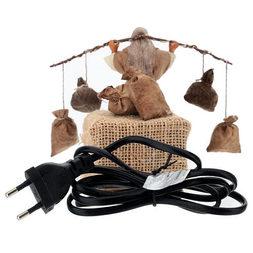 Homme avec 4 sacs mouvement crèche napolitaine 10 cm 4