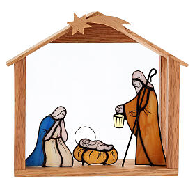 Nativity Holy Family in colored glass with wooden stable