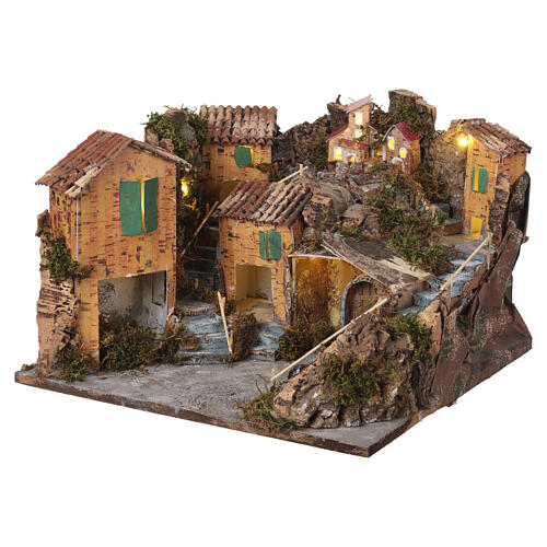 Lighted village with houses 25x35x35 cm Neapolitan nativity scene 8-10 cm 2